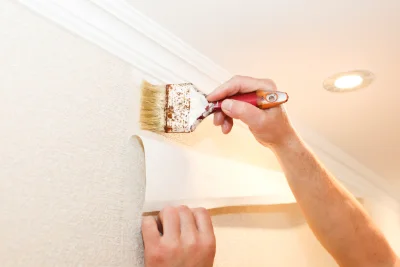 Pose de papier peint à Taillette — revêtements muraux et toiles de verre